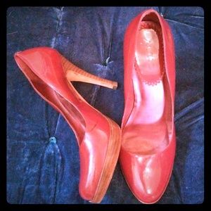 Red and wood grain pump